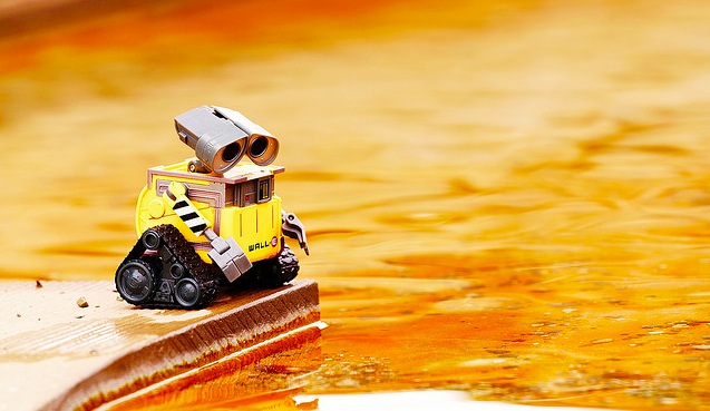 WALL-E WALL-E looking at a puddle
