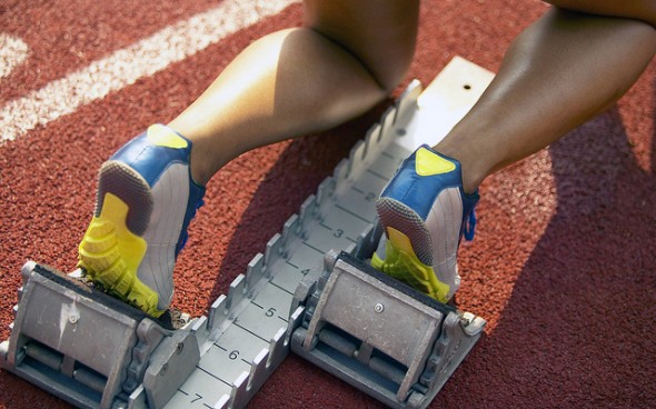 Sprinter on his mark sprinter lined up on the starting blocks