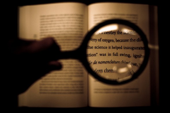 book and magnifying glass book and magnifying glass