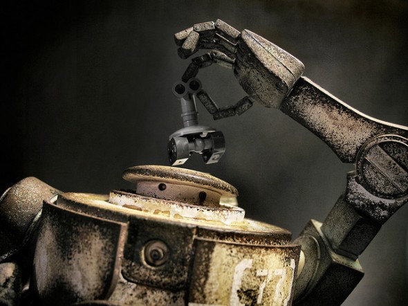 Automaton Robot Holding Robot Automaton robot holding smaller robot overhead