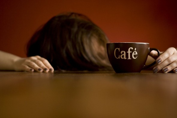 Passed out on table with coffee mug